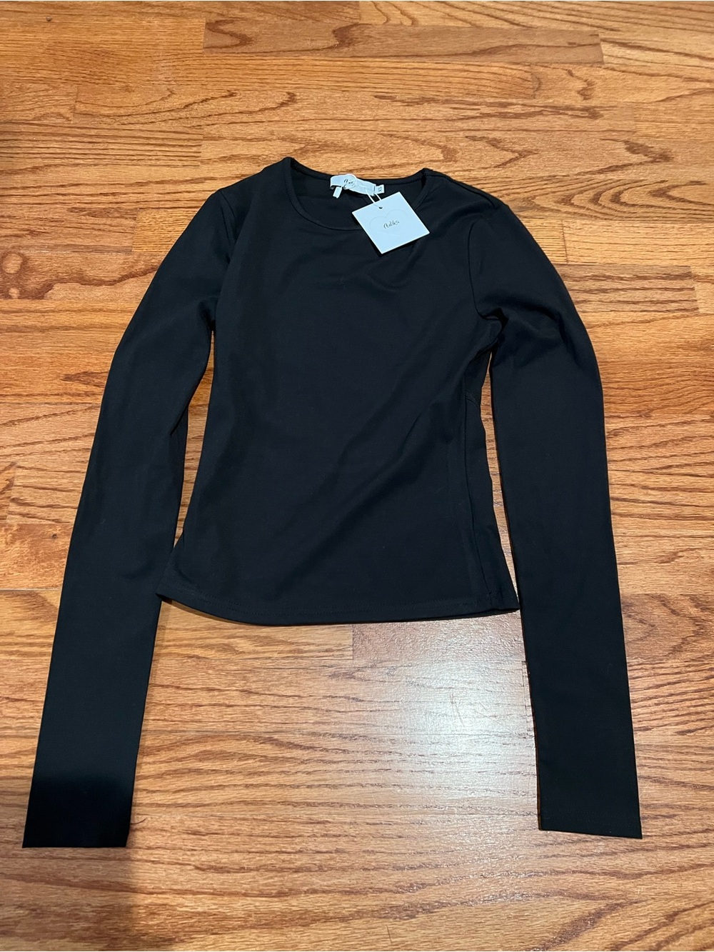 Adika Black Long Sleeve Crewneck Top